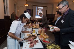 Library board member Jim McRae at the popular smoked meat station